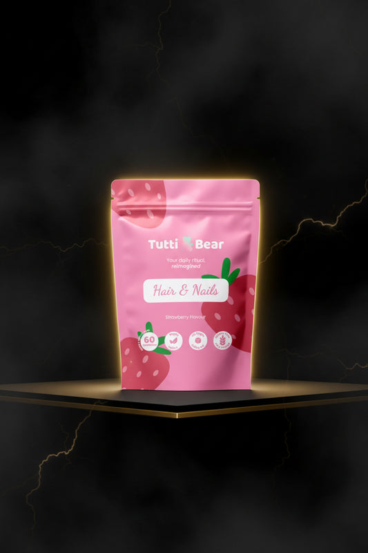 Gomas para cabelo e unhas tutti Bear em embalagem do tipo doypack, com frutas e ingredientes naturais visíveis na imagem.