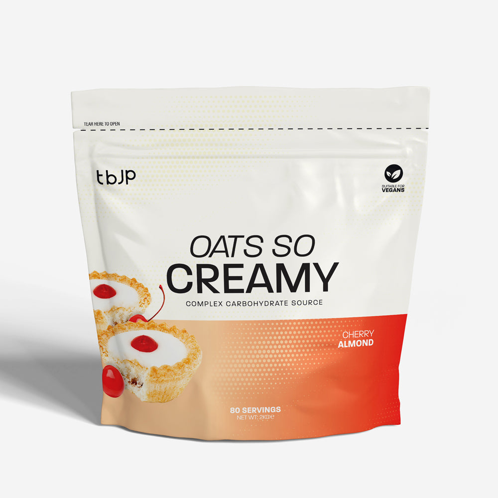Aveia TBJP Oats So Creamy de 2kg com sabor de cereja e amêndoas, embalagem de 2kg, destaque na imagem.