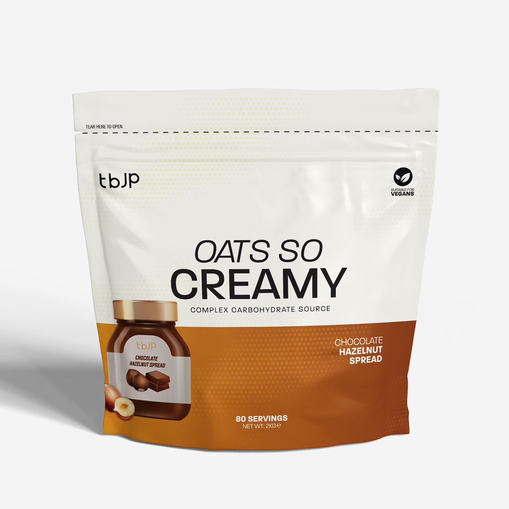 Aveia TBJP Oats So Creamy de 2kg com sabor a chocolate e avelã, em embalagem colorida com pote de aveia e ingredientes.