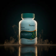 Imagem de frasco com 60 cápsulas de Ashvagandha Himalaya, suplemento natural para bem-estar e equilíbrio hormonal.